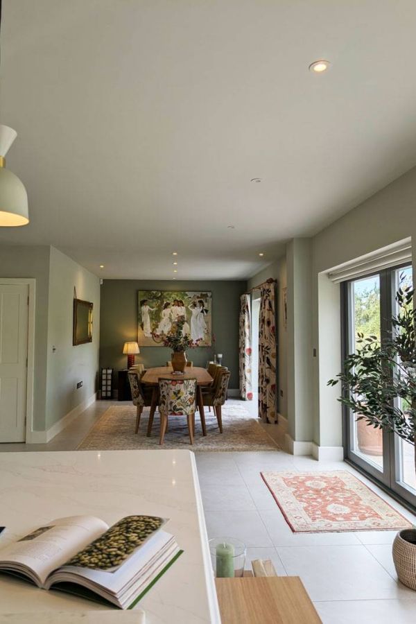 A Dining room in an open aspect living plan