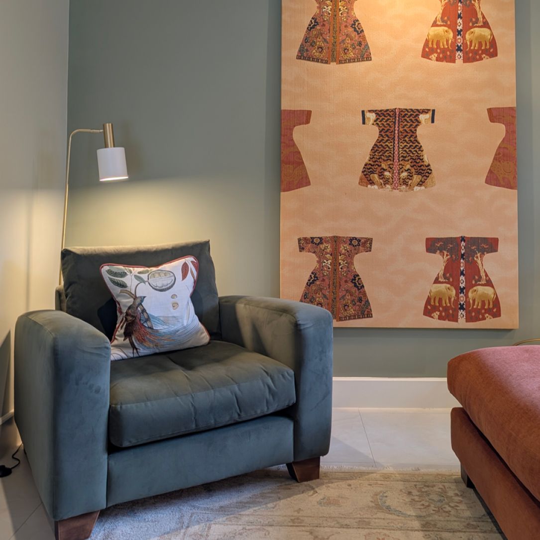 a sofa in a corner of a living room