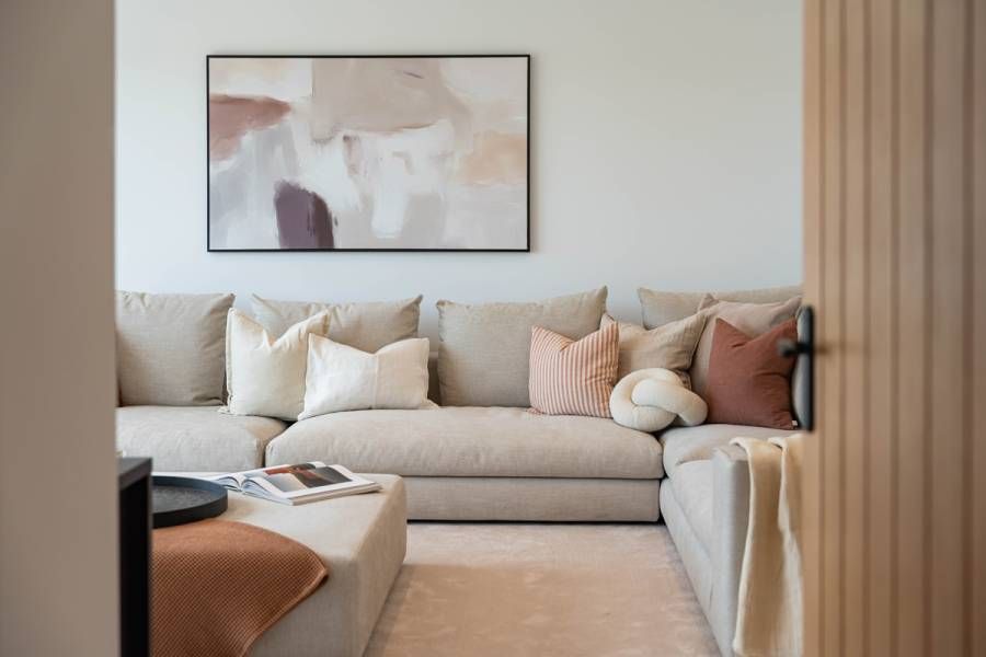 beige sofa in a modern interior designed living room